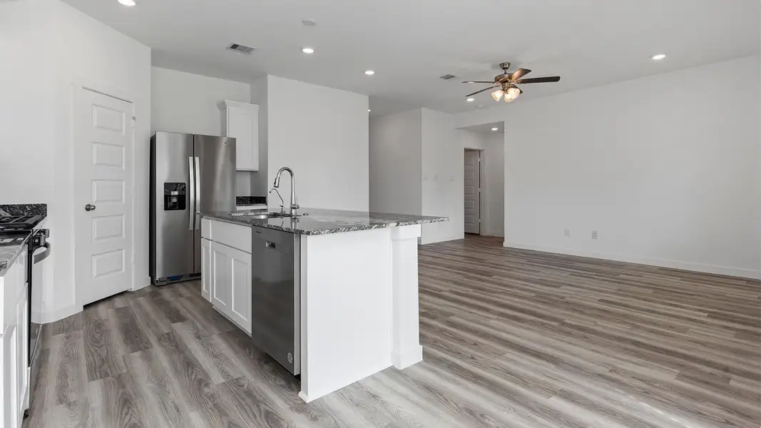 Furnished interior view inside a new home in Caldwell Crossing, Iowa Colony (Image 9). Furnished interior view inside a new home in Caldwell Crossing, Iowa Colony (Image 9).