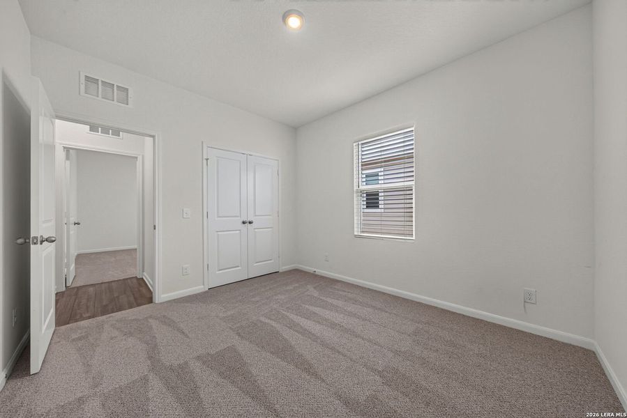 Spacious, unfurnished interior of a new home in Hennersby Hollow, San Antonio (Image 21).
