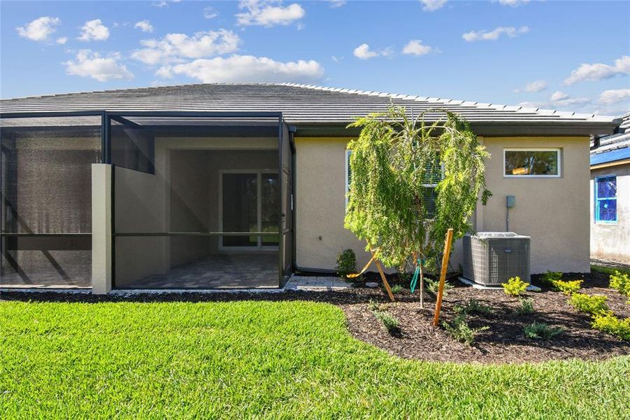 Exterior details and patio area of a home in Sweetwater at Lakewood Ranch, Lakewood Ranch (Image 2).
