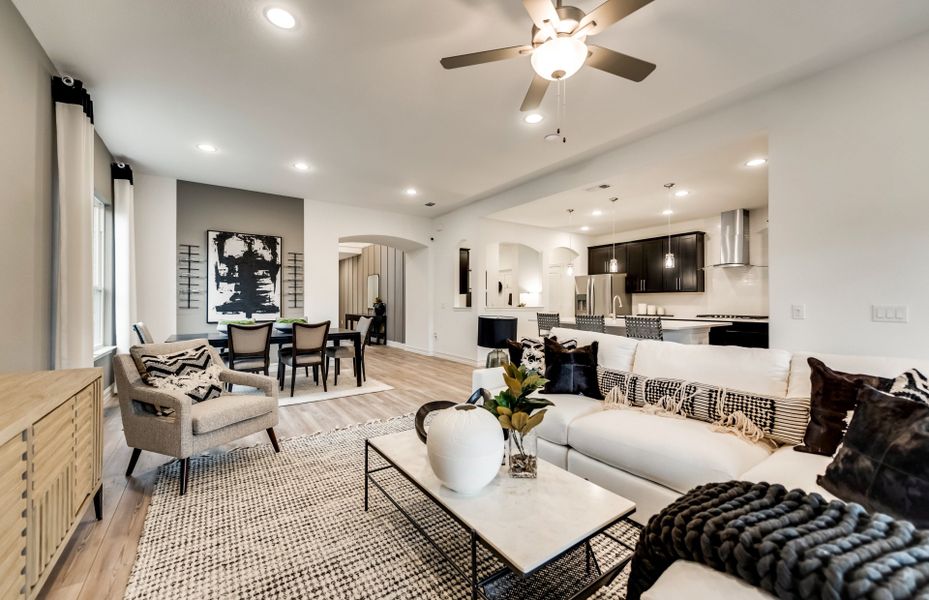 Gathering room with views of kitchen and dining areas