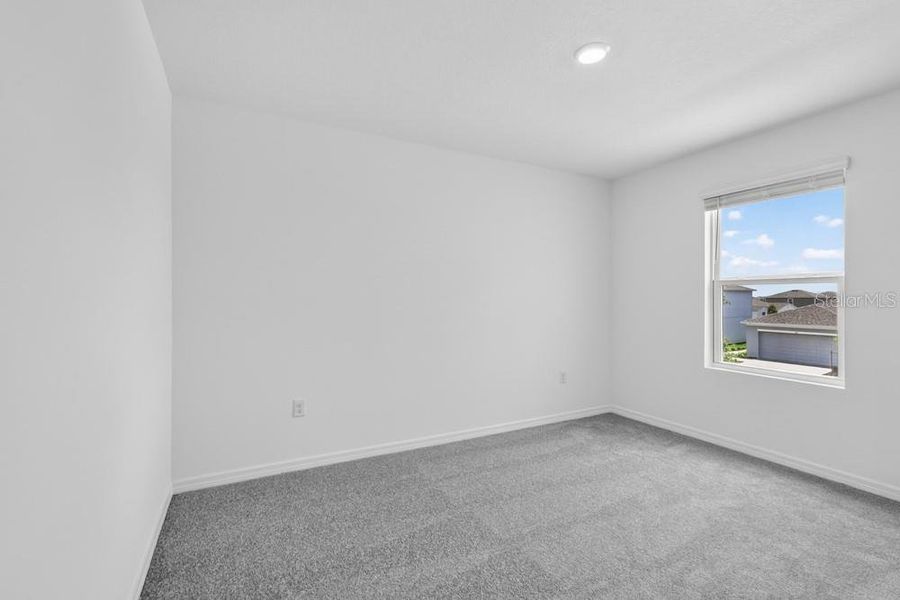 Spacious, unfurnished interior of a new home in Waterstone, Groveland (Image 45).