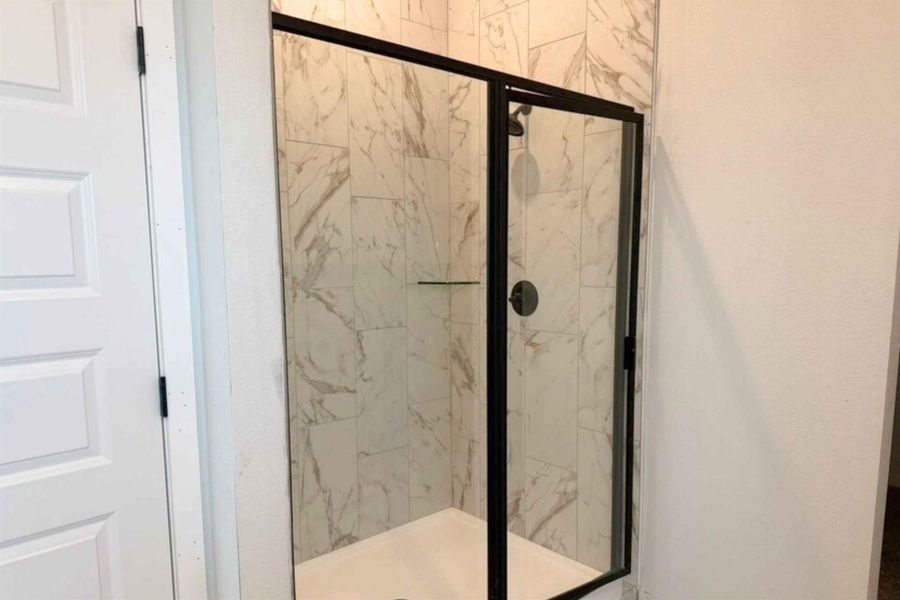 Bathroom featuring a stall shower