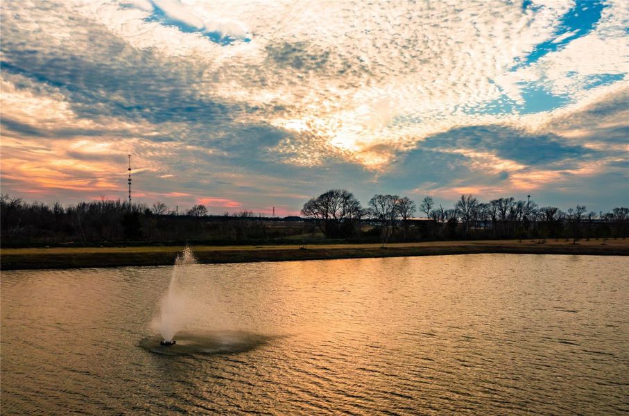 Breathtaking sunset view over Adventure Lake, captured by a local resident with full permission for use.