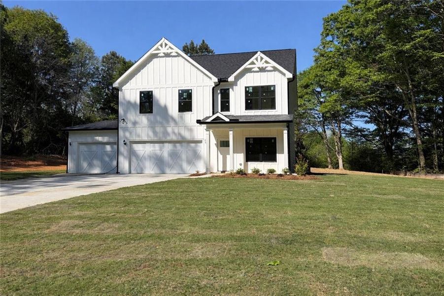 Front exterior of a new home in , Jefferson, GA, highlighting curb appeal (Image 15).