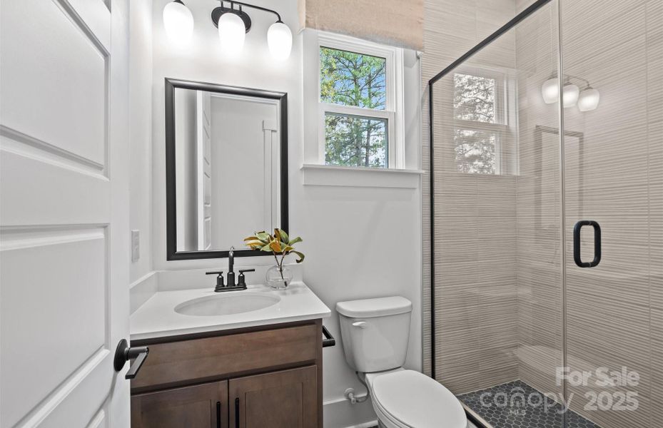 Guest suite bathroom.  Representative photo