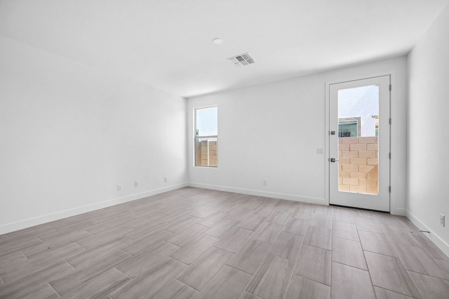 Representative unfurnished interior of a home built from the Caliber by Taylor Morrison in Artisan at Asante, Surprise (Image 22). Representative unfurnished interior of a home built from the Caliber by Taylor Morrison in Artisan at Asante, Surprise (Image 22).