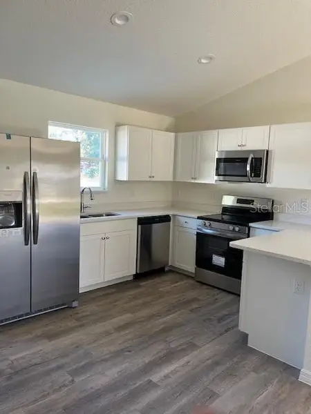 Furnished interior view inside a new home in , Belleview (Image 3).