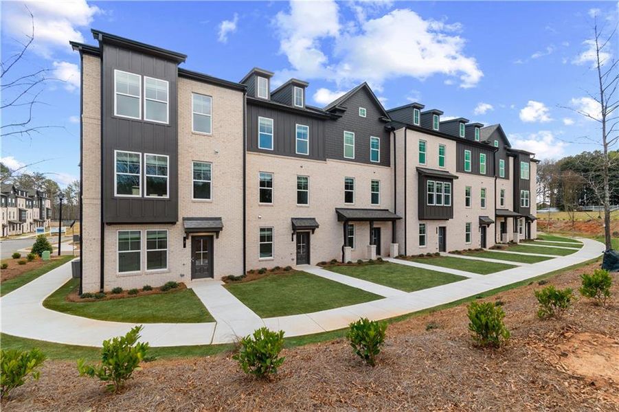 Front exterior of a new home in Daybreak, Newnan, GA, highlighting curb appeal (Image 15).