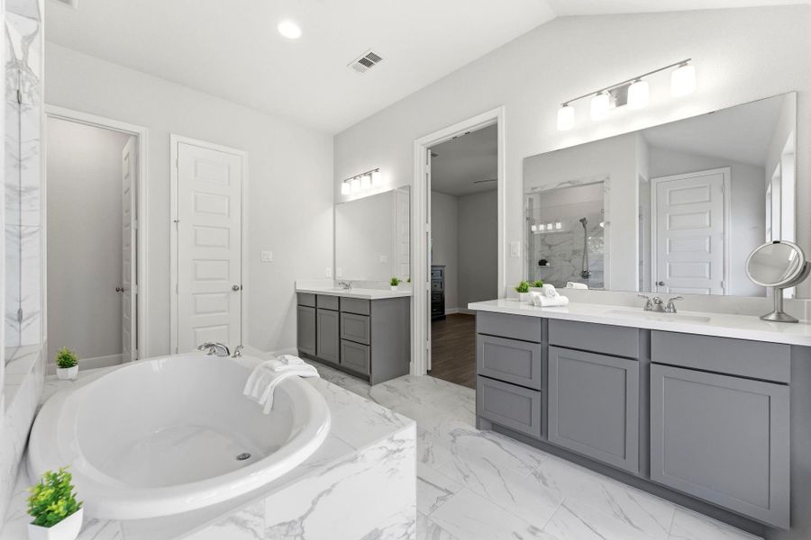 Primary Ensuite Bath, Neutral Colors, Dual Sink Vanity w/spacious cabinetry! Large Soaking Tub. An Elegant, Relaxing Escape to end your day! Primary Ensuite Bath, Neutral Colors, Dual Sink Vanity w/spacious cabinetry! Large Soaking Tub. An Elegant, Relaxing Escape to end your day!