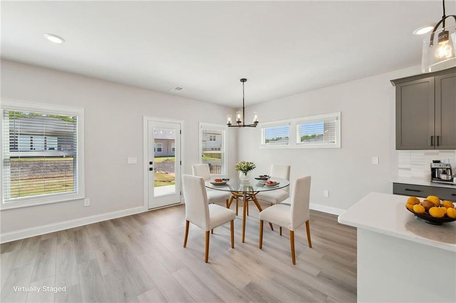 Furnished interior view inside a new home in Vines at Mill Creek - Estate Series, Braselton (Image 18).