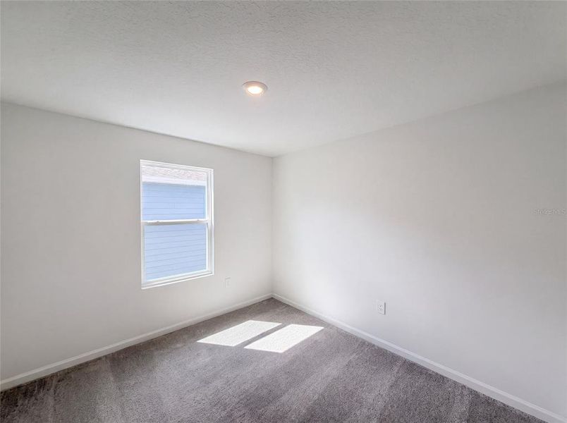 Spacious, unfurnished interior of a new home in Ranches at Lake Mcleod, Eagle Lake (Image 17).