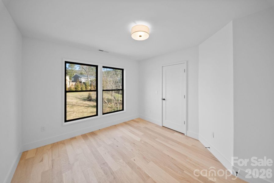 Spacious, unfurnished interior of a new home in , Asheville (Image 14).