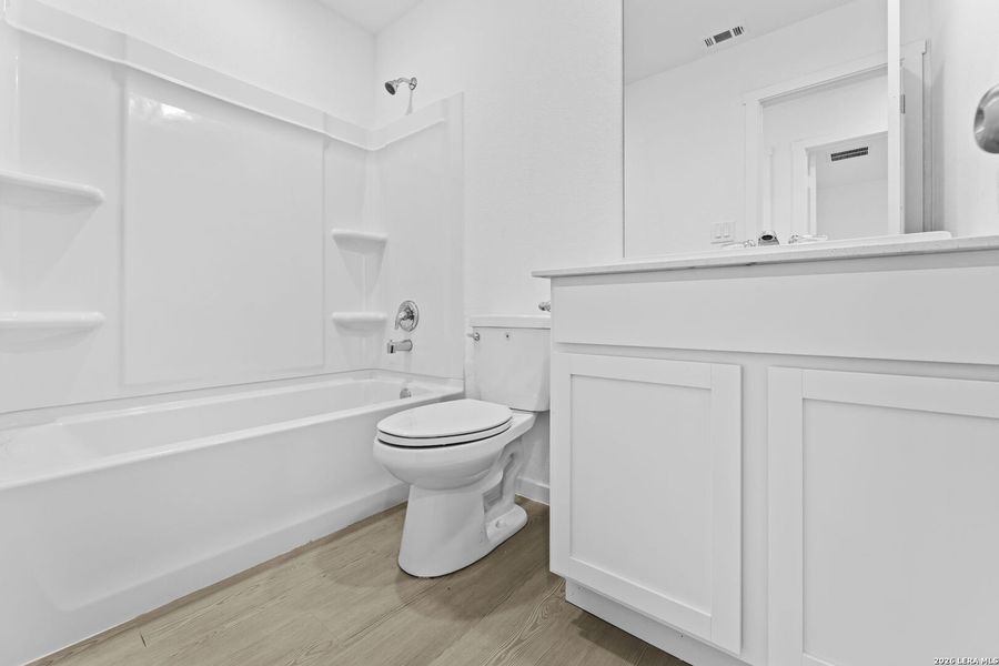 Furnished interior view inside a new home in Spring Grove, St. Hedwig (Image 7).