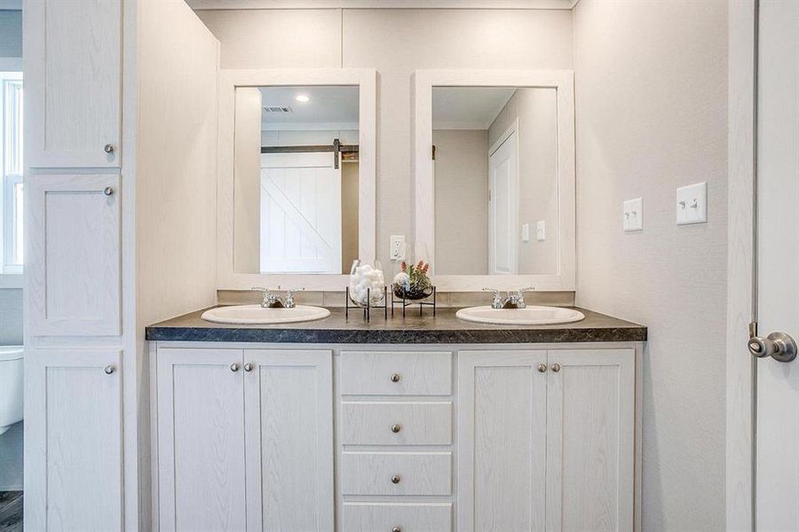 Bathroom with vanity and toilet