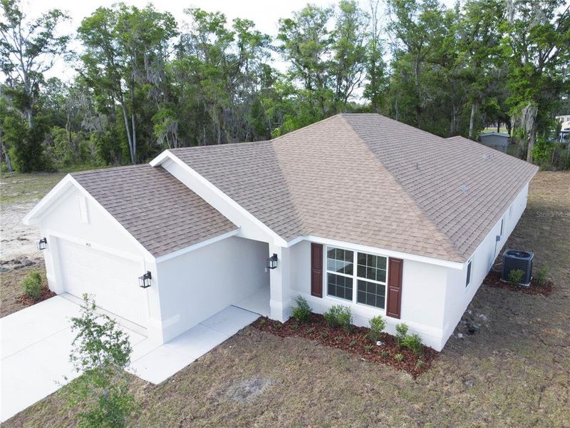 Front exterior of a new home in , Ocala, FL, highlighting curb appeal (Image 17).