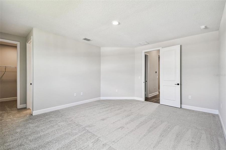 Spacious, unfurnished interior of a new home in Solace at Corner Lake, Orlando (Image 56).