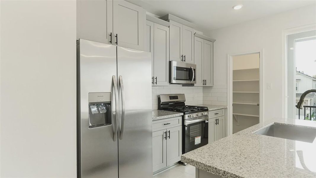 Representative furnished interior of a home built from the Rev 2232NC by Saratoga Homes in Aldine Pines, Houston (Image 6). Representative furnished interior of a home built from the Rev 2232NC by Saratoga Homes in Aldine Pines, Houston (Image 6).