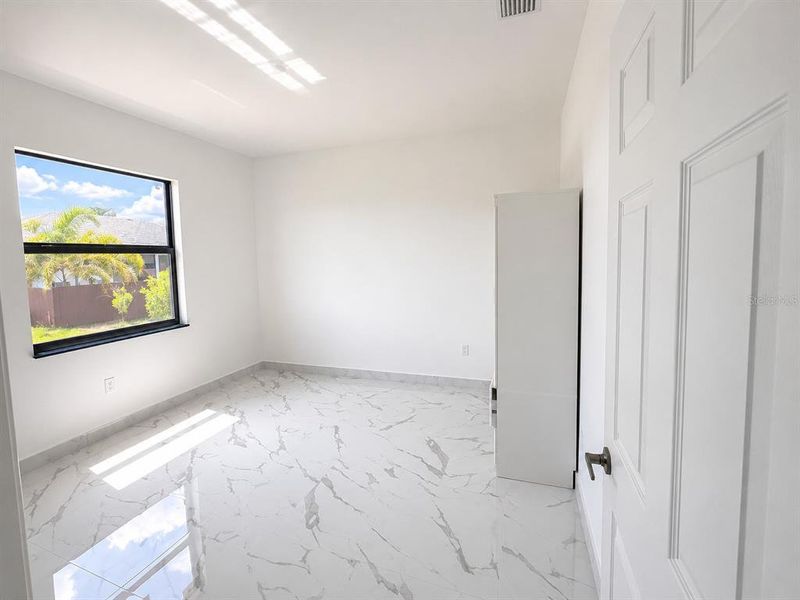 Spacious, unfurnished interior of a new home in , Cape Coral (Image 13). Spacious, unfurnished interior of a new home in , Cape Coral (Image 13).