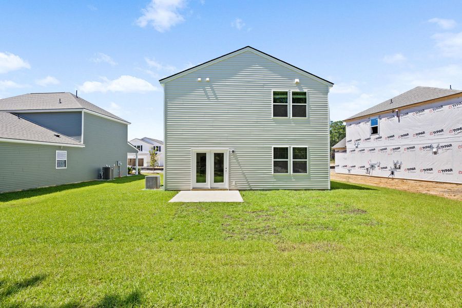 Front exterior of a new home in Bradford Pointe, Summerville, SC, highlighting curb appeal (Image 2).