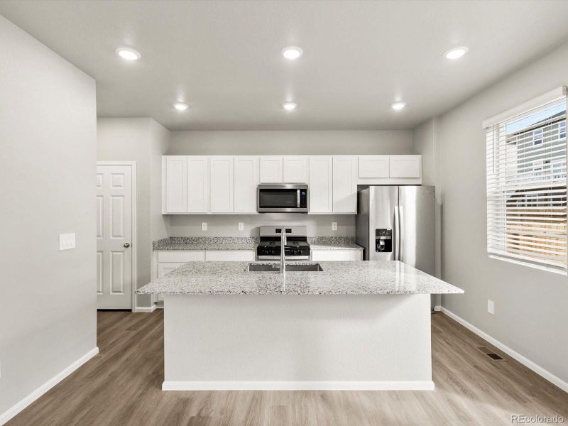 Furnished interior view inside a new home in Lake Bluff, Greeley (Image 11).