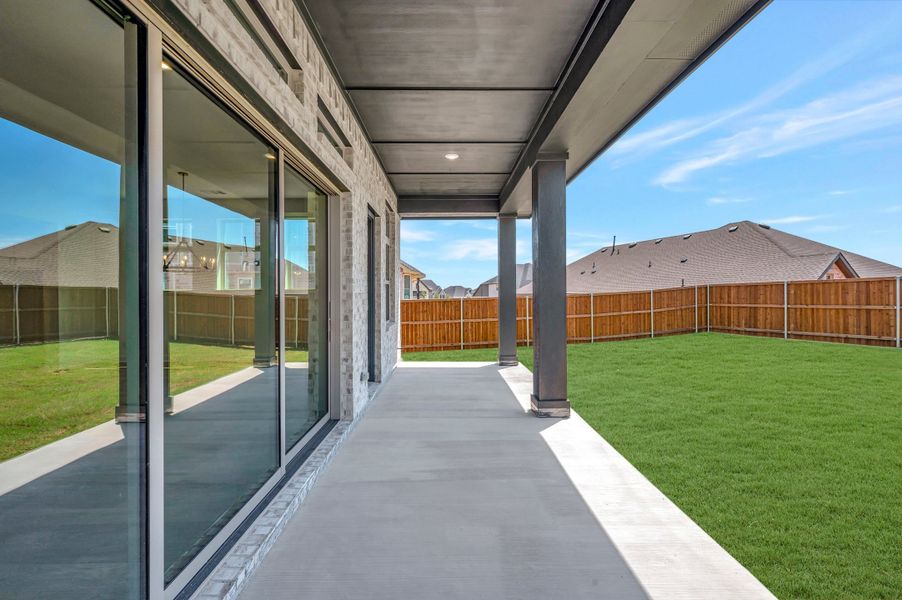 Exterior details and patio area of a home in Sandbrock Ranch, Aubrey (Image 4). Exterior details and patio area of a home in Sandbrock Ranch, Aubrey (Image 4).