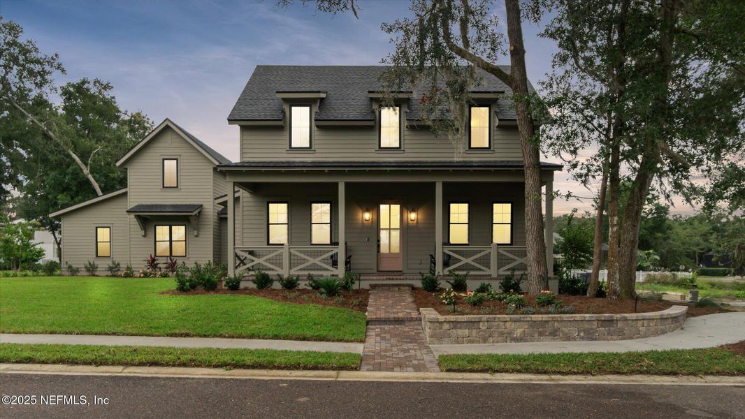 Front exterior of a new home in , Yulee, FL, highlighting curb appeal (Image 1). Front exterior of a new home in , Yulee, FL, highlighting curb appeal (Image 1).