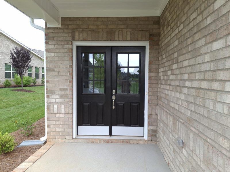 Exterior details and patio area of a home in Weybridge, Burlington (Image 3).