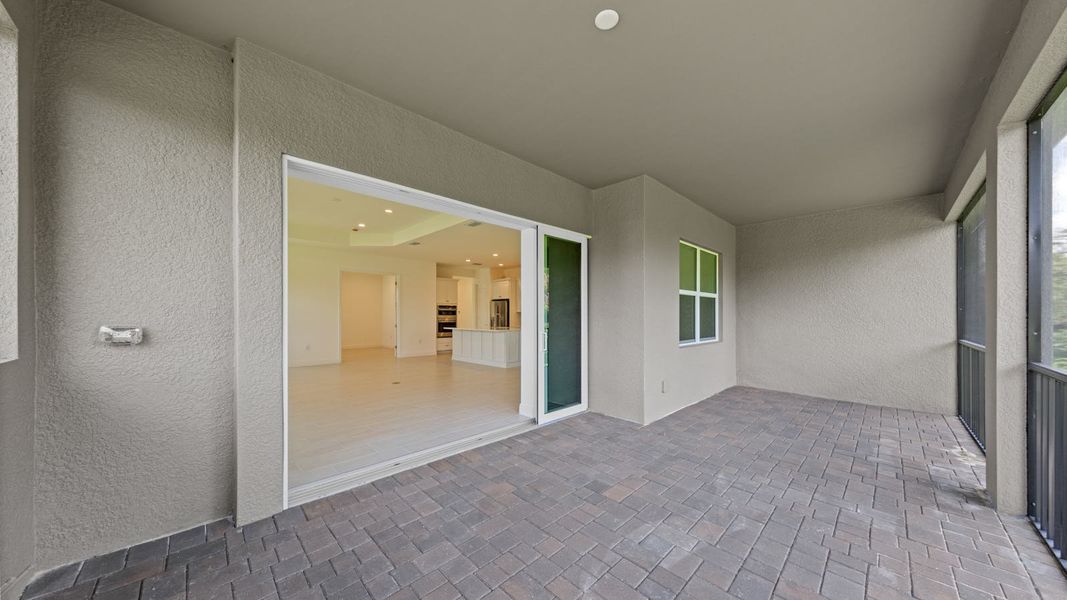 Exterior details and patio area of a home in Verandah Real Estate and Homes for Sale in Fort Myers, FL - Neal Communities, Fort Myers (Image 4).