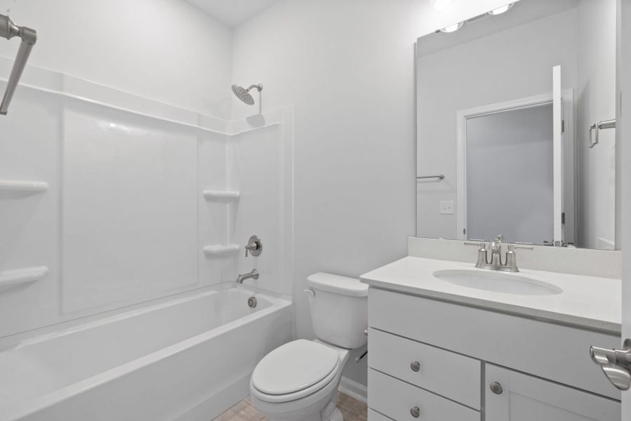 Furnished interior view inside a new home in Exchange at 401, Raleigh (Image 8).