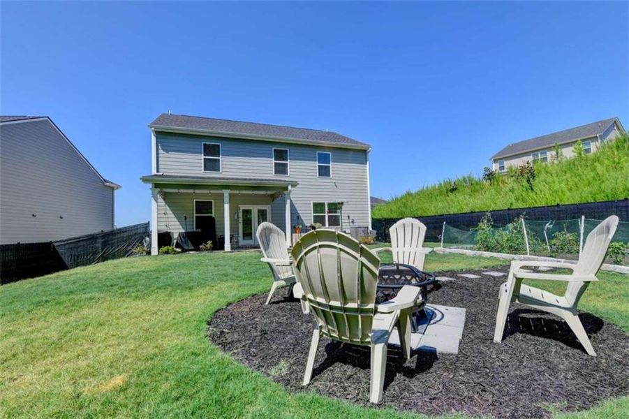 Exterior details and patio area of a home in Twin Lakes, Hoschton (Image 26).