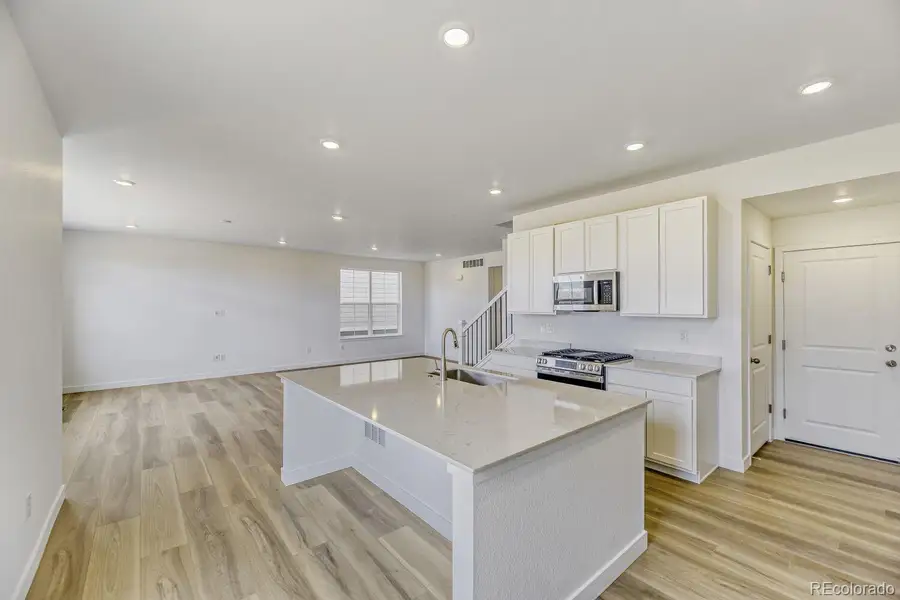 Furnished interior view inside a new home in Vermilion Creek, Centennial (Image 3).