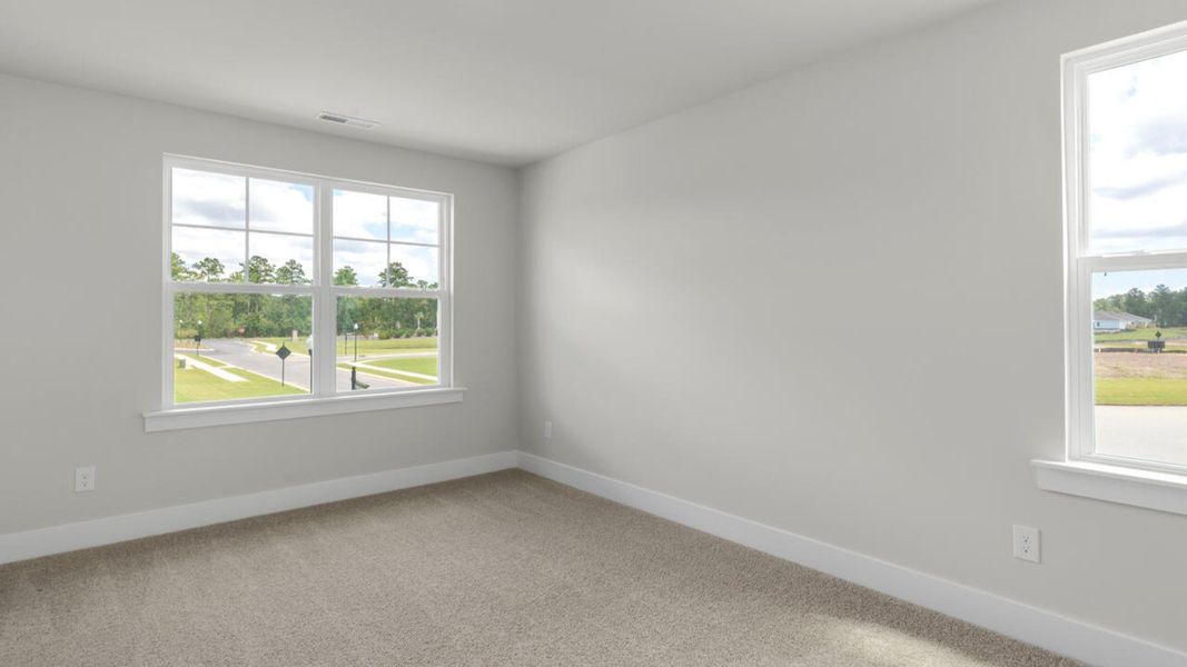 Spacious, unfurnished interior of a new home in Indigo Preserve Townhomes, Leland (Image 29).