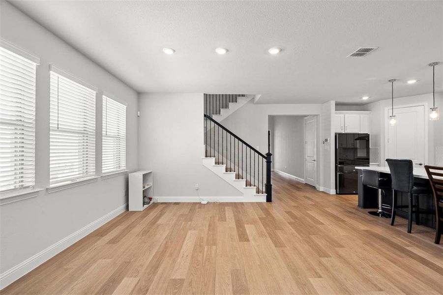 Living room featuring light hardwood / wood-style flooring