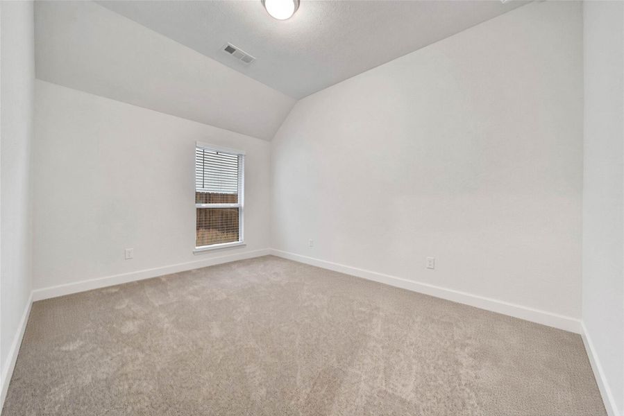 Secondary bedrooms are light and bright with generous closet space.