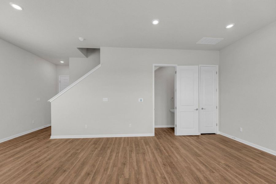 Unfurnished living room featuring recessed lighting and light wood-style flooring