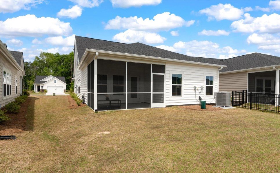 Exterior details and patio area of a home in Horizons at Summers Corner | 55+, Summerville (Image 27).