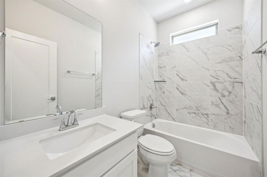 Bathroom in the Wimbledon home plan by Trophy Signature Homes – REPRESENTATIVE PHOTO Bathroom in the Wimbledon home plan by Trophy Signature Homes – REPRESENTATIVE PHOTO