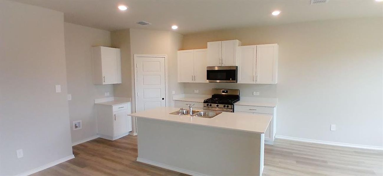 Kitchen - All Home and community information, including pricing, included features, terms, availability and amenities, are subject to change at any time without notice or obligation. All Drawings, pictures, photographs, video, square footages, floor plans, elevations, features, colors and sizes are approximate for illustration purposes only and will vary from the homes as built.