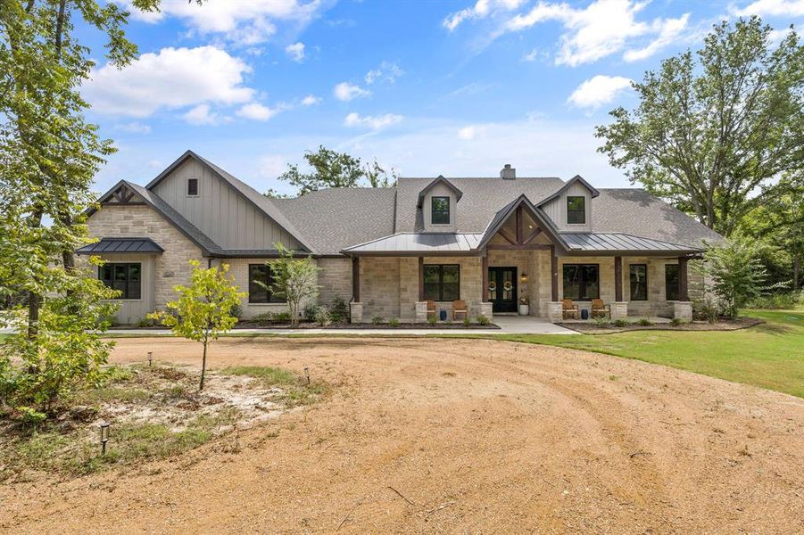 Front exterior of a new home in , Van Alstyne, TX, highlighting curb appeal (Image 18). Front exterior of a new home in , Van Alstyne, TX, highlighting curb appeal (Image 18).