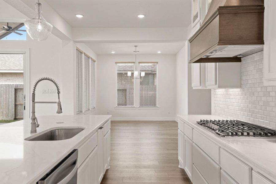 Furnished interior view inside a new home in The Highlands - 65', Porter (Image 13).