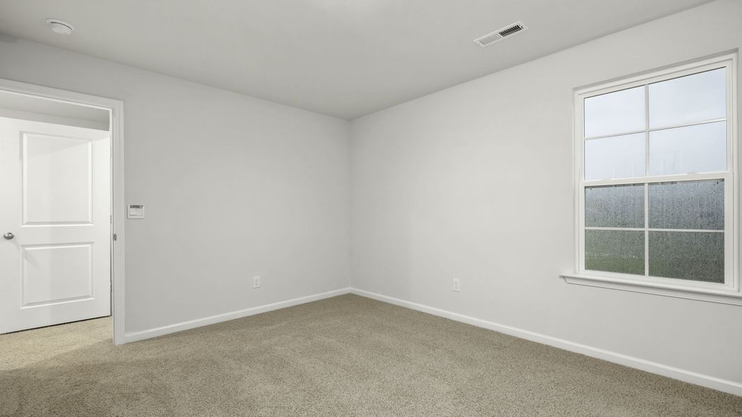 Representative unfurnished interior of a home built from the Manning by D.R. Horton in Chandler Pointe, Rural Hall (Image 19).