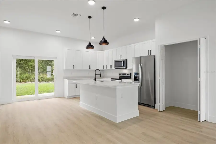 Furnished interior view inside a new home in , Ocala (Image 3).