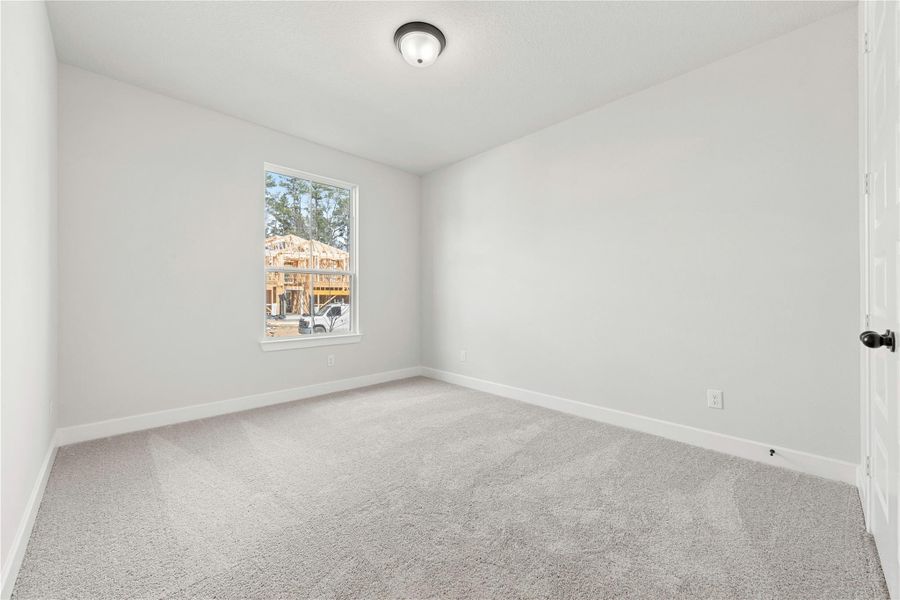 Spacious, unfurnished interior of a new home in The Woodlands Hills, Willis (Image 18).