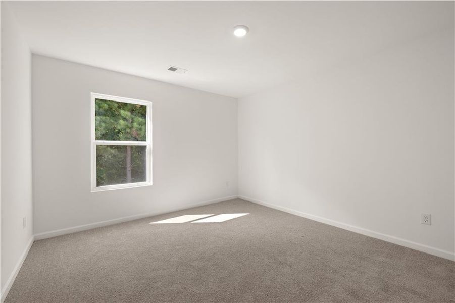 Spacious, unfurnished interior of a new home in The Reserve at Calcutta, Stockbridge (Image 33).