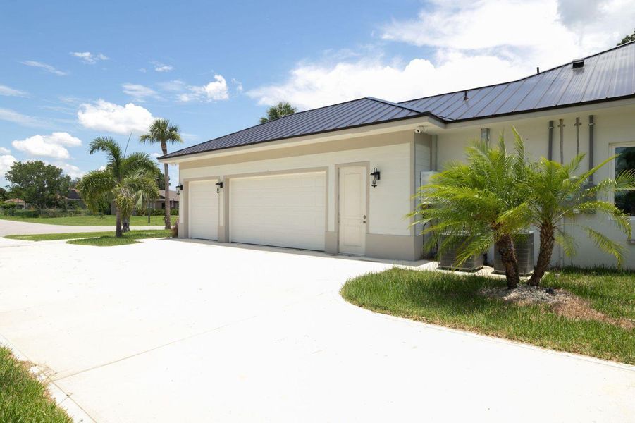 Front exterior of a new home in , Port St. Lucie, FL, highlighting curb appeal (Image 19).