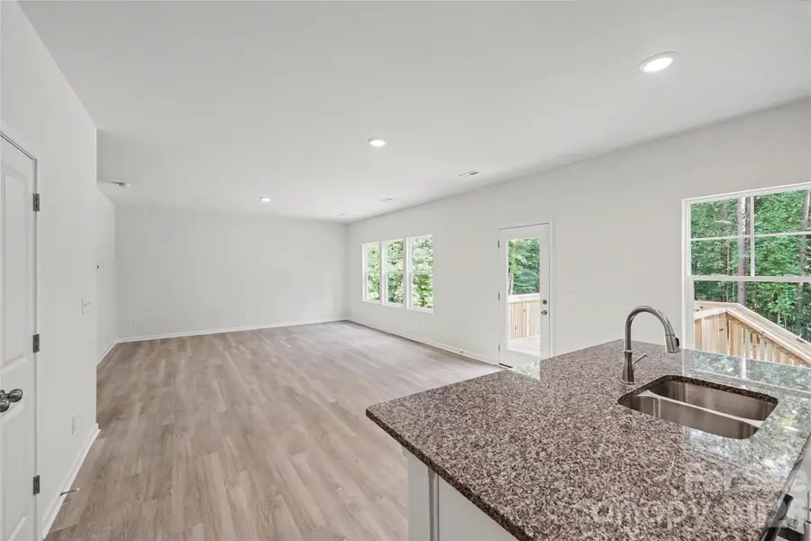 Spacious, unfurnished interior of a new home in , Iron Station (Image 18).