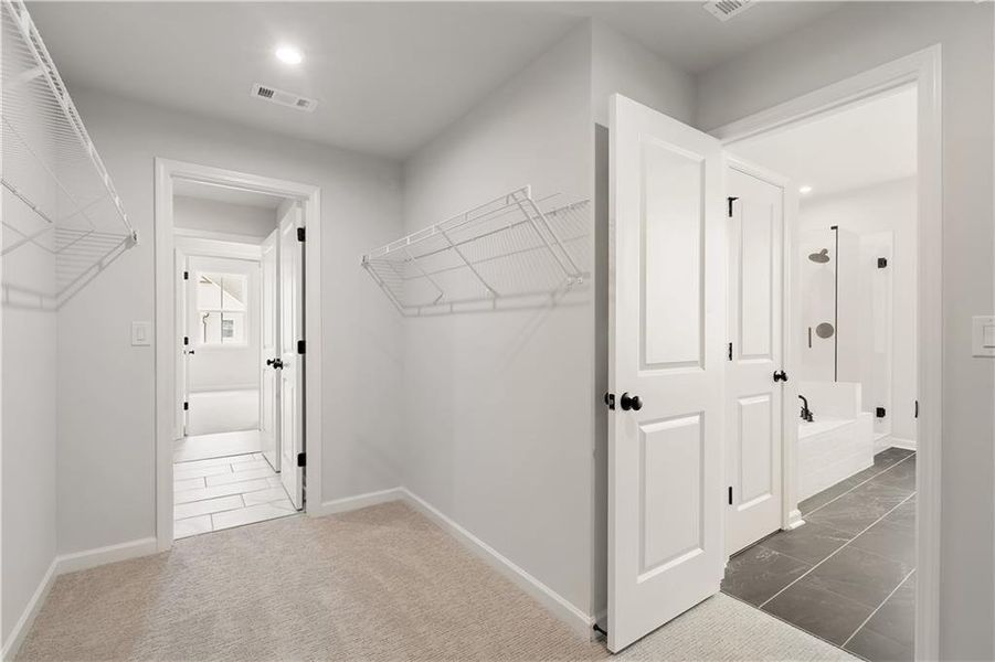 Spacious, unfurnished interior of a new home in The Paddocks at Doc Hughes, Buford (Image 32).