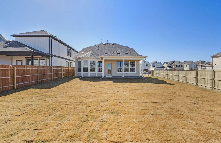 Exterior details and patio area of a home in Santa Rita Ranch, Liberty Hill (Image 25).