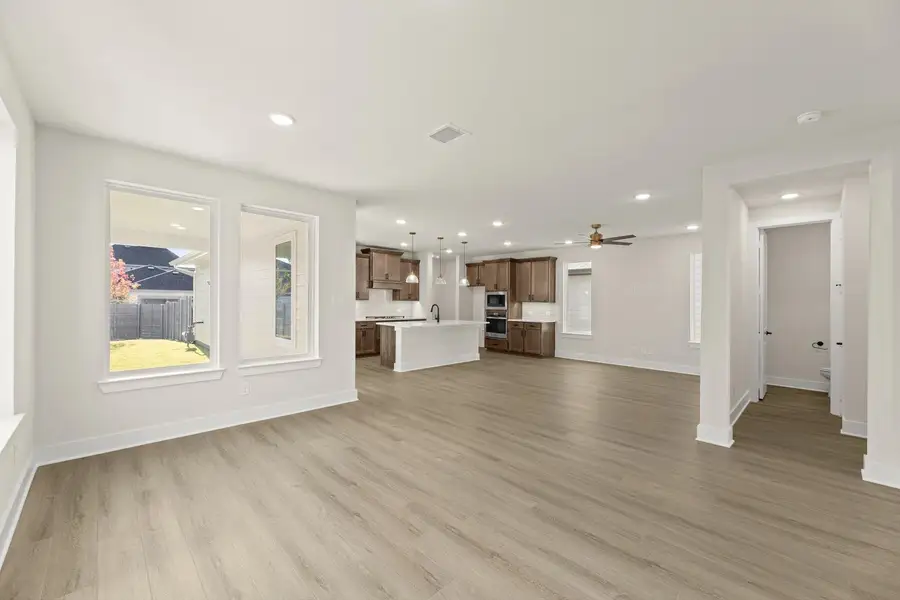 Spacious, unfurnished interior of a new home in Carriage Collection at Painted Tree, McKinney (Image 16).