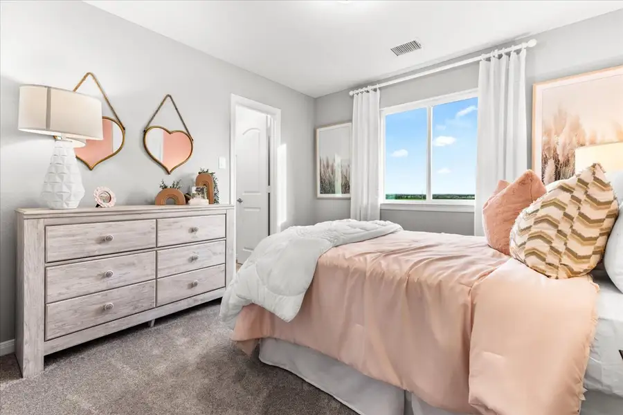 Furnished interior view inside a new home in The Reserve at Spiritas Ranch, Little Elm (Image 15).